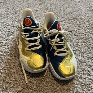 Brand new Curry Under Armour Kids' Navy and Gold Sneakers